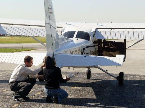 two people and a business jet