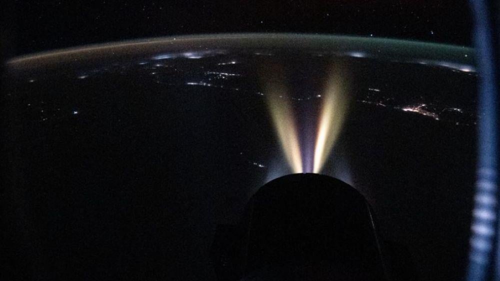 The Draco thrusters of the SpaceX Dragon cargo spacecraft are seen firing during a demonstration of its ability to reboost the International Space Station’s orbit on Sept. 26, 2025.