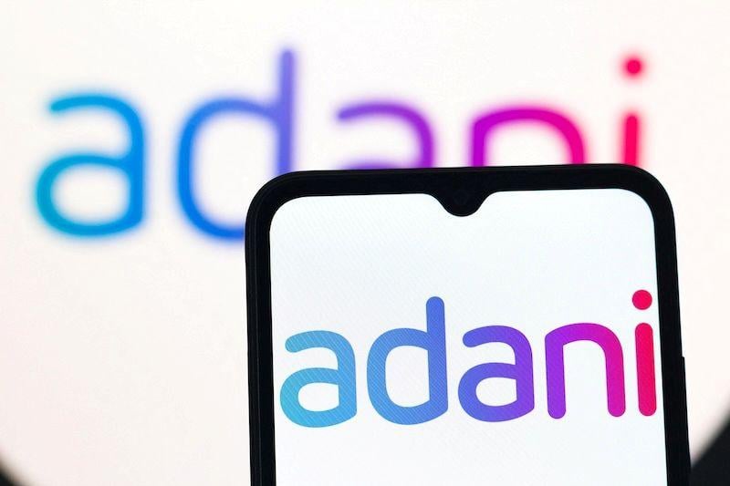 Adani text on a cellphone screen