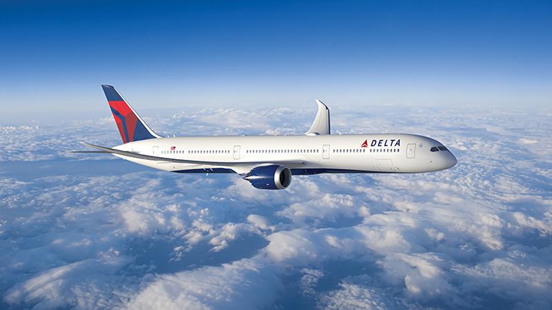 Concept of Delta Air Lines Boeing 787 flying above clouds