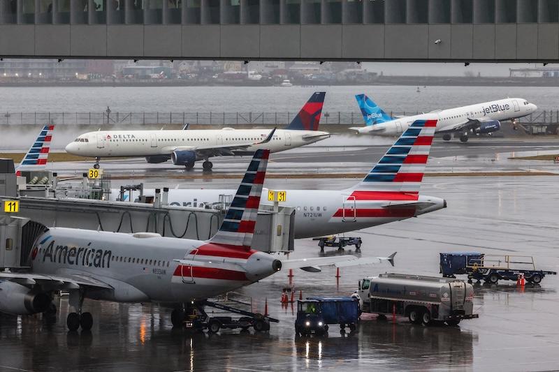 various airline jets on the tarmac