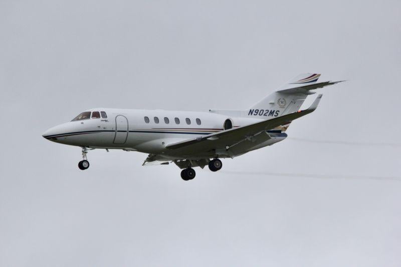 A Hawker 900XP descends to land. 