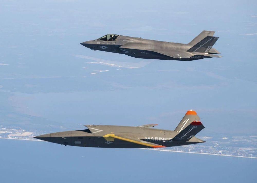 A U.S. Marine Corps F-35 flies with a Kratos XQ-58, which has been selected as its first collaborative combat aircraft. Credit: U.S. Marine Corps