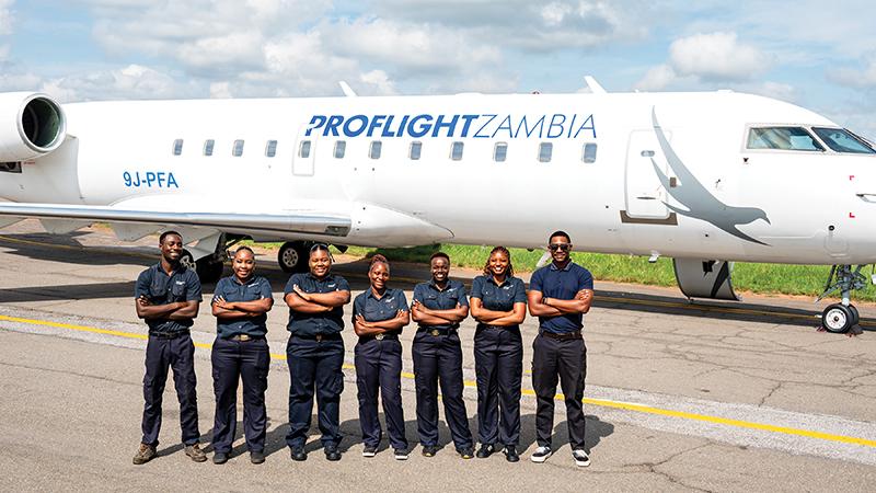 ProFlight Zambia crew in front of aircraft