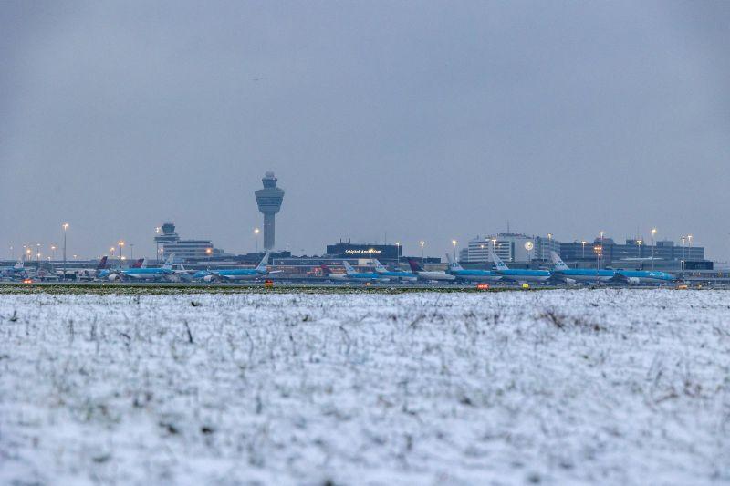 Amsterdam Schiphol Airport in the winter of 2025 with snow on the ground