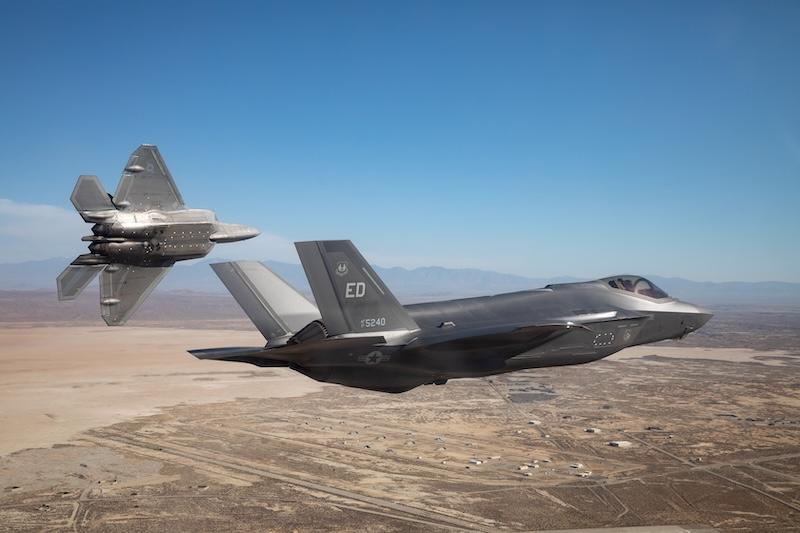 U.S. Air Force F-22 and F-35 during a test flight at Edwards AFB, California, in 2023.