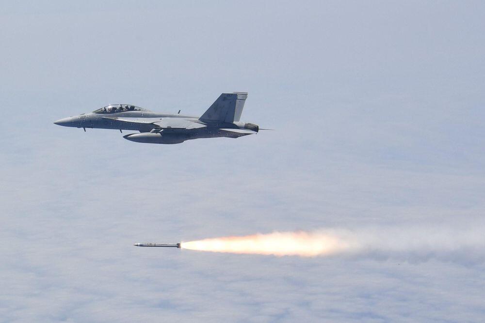 U.S. Navy  Caption: A F/A-18F Super Hornet fires an AARGM-ER missile during an early test flight.