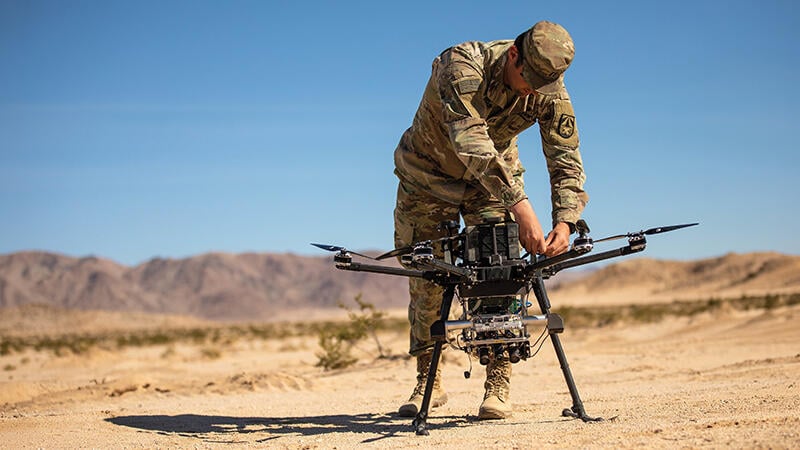 U.S. Army soldier handling drone