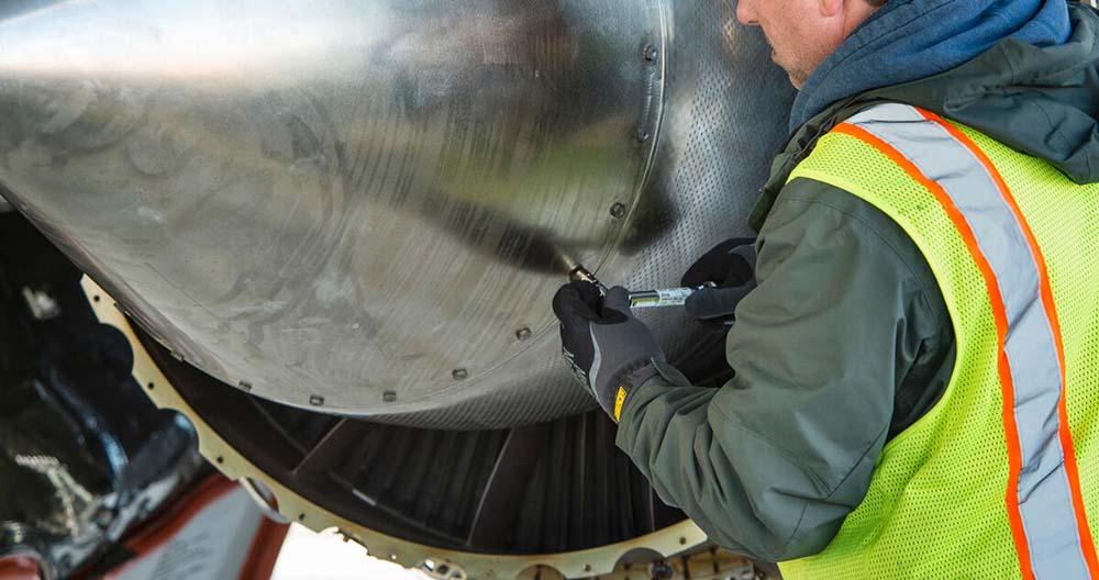 AOG technician working on aircraft
