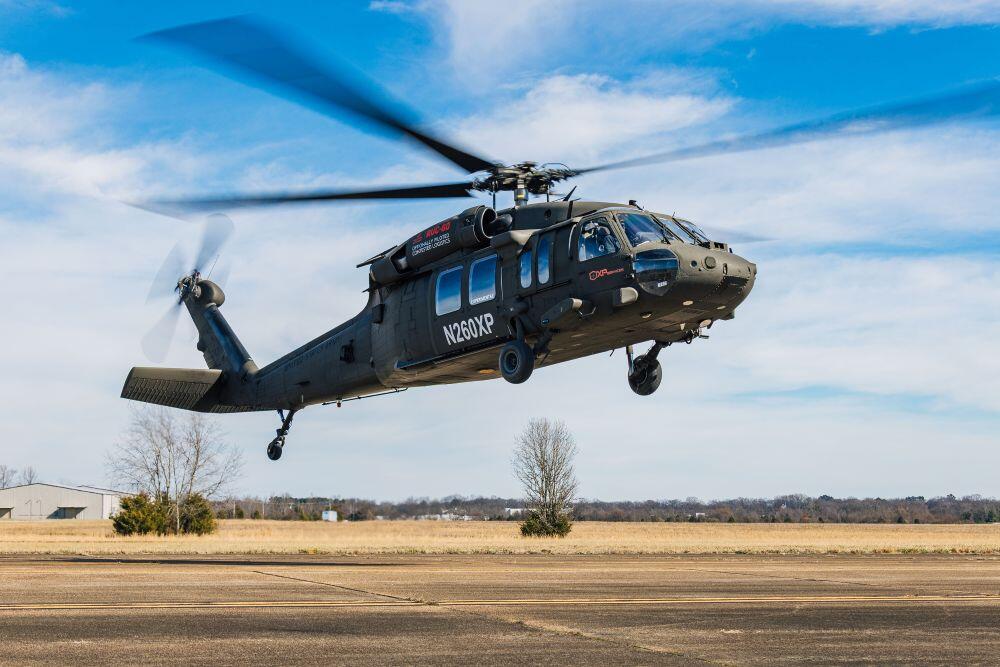 – Near Earth Autonomy  Caption – Near Earth Autonomy is flying an ex-U.S. Army Sikorsky UH-60L Black Hawk converted into an RUC-60 uncrewed logistics platform