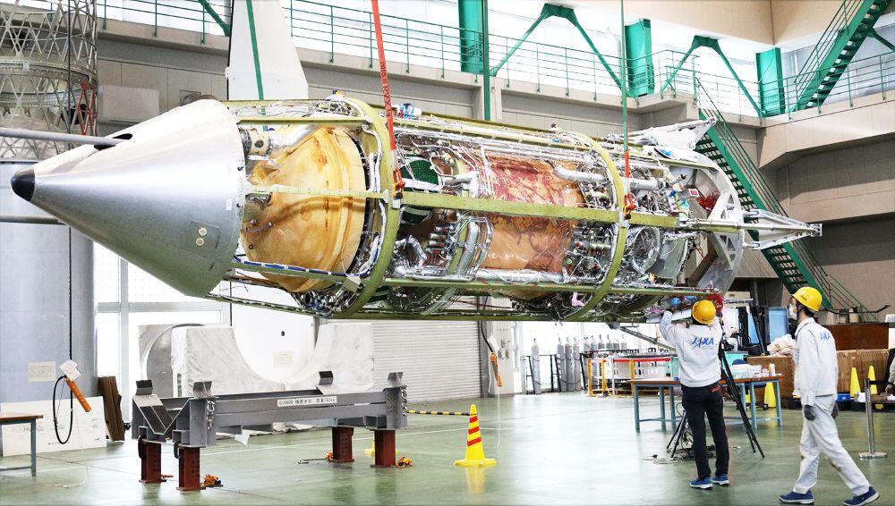 Japan Aerospace Exploration Agency  Caption – RV-X is a small experimental demonstrator for the vertical-takeoff-and-vertical-landing reusable first stage of a future launch vehicle