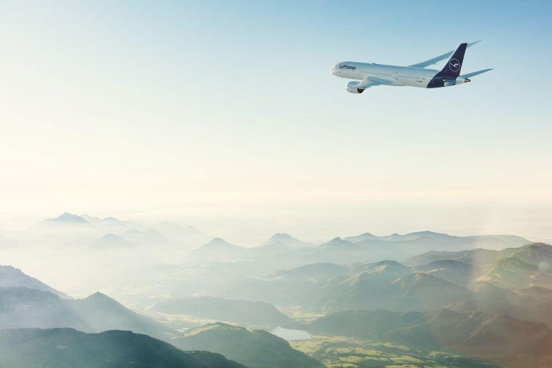 Lufthansa aircraft inflight over mountains
