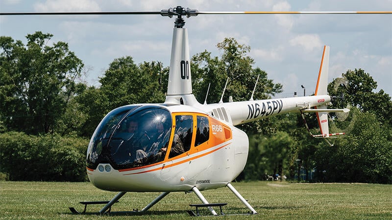 Robinson R66 on grass