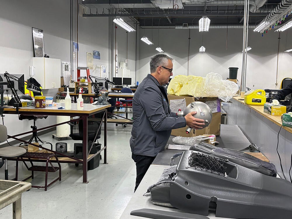 Archie Vega in the accessories shop