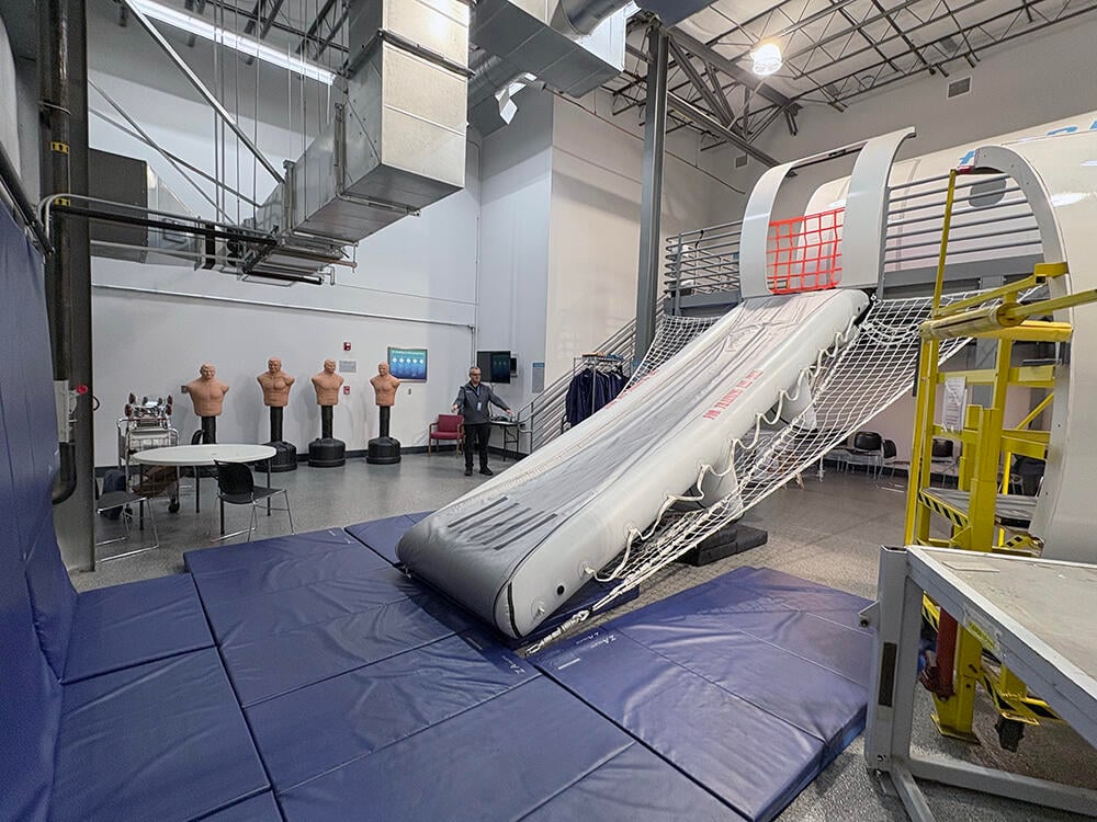 Evacuation slide trainer