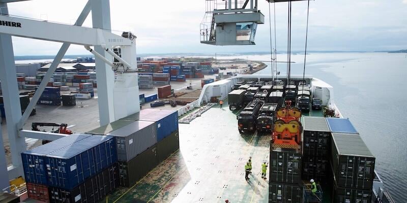 defense logistics containers on a boat