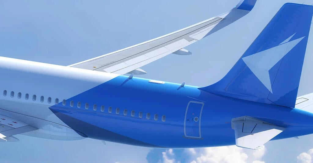 A closeup of an aircraft's rear fuselage and tail.