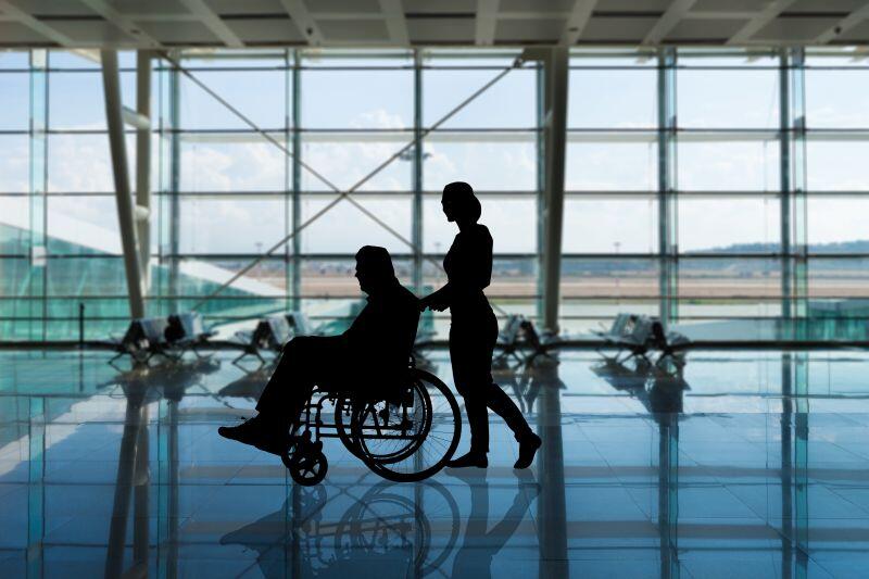 Man in a wheelchair at the airport