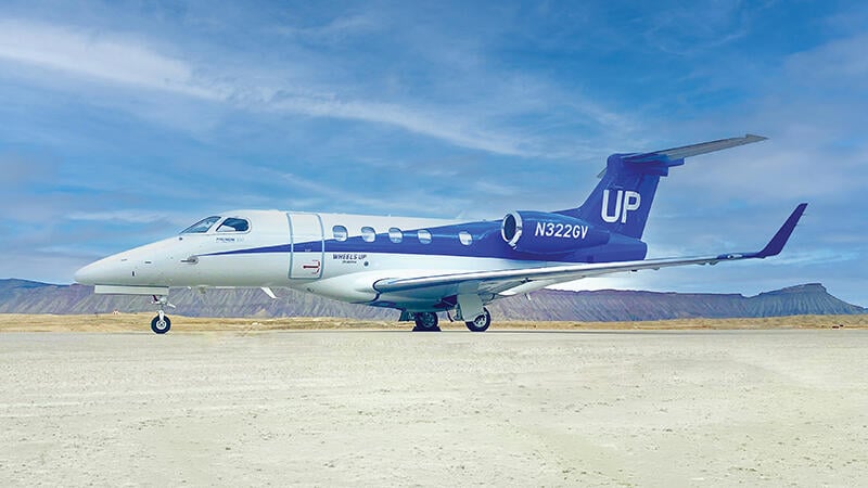 Embraer Phenom 300 with Wheels Up livery