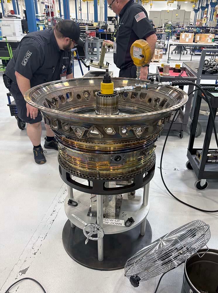 Technicians working on engine rotors