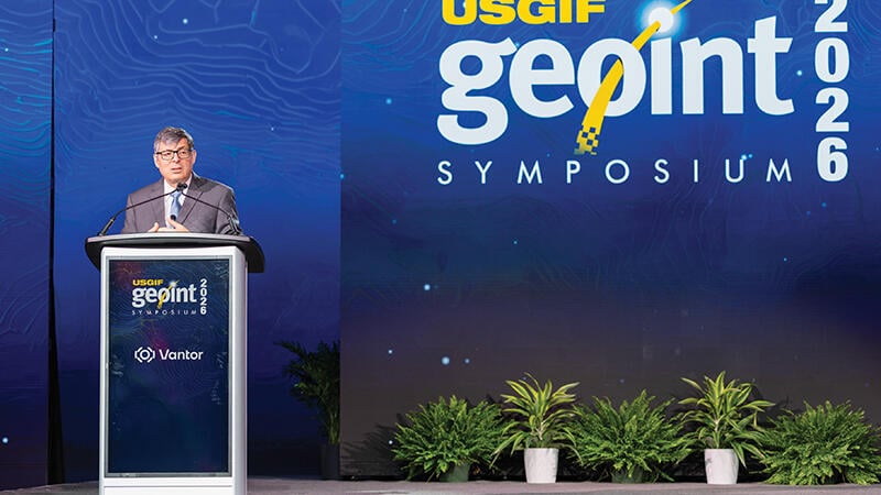 executive speaking at symposium