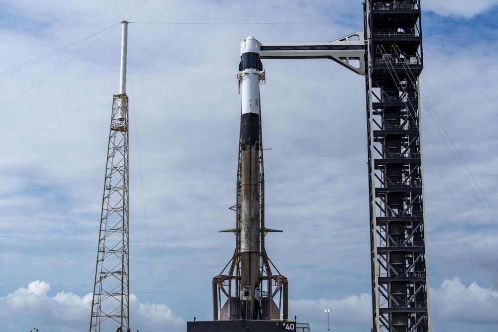 A SpaceX Falcon 9 rocket, with the company’s Dragon spacecraft atop, stands at Space Launch Complex 40 at Cape Canaveral Space Force Station in Florida on Wednesday, May 13, 2026, i