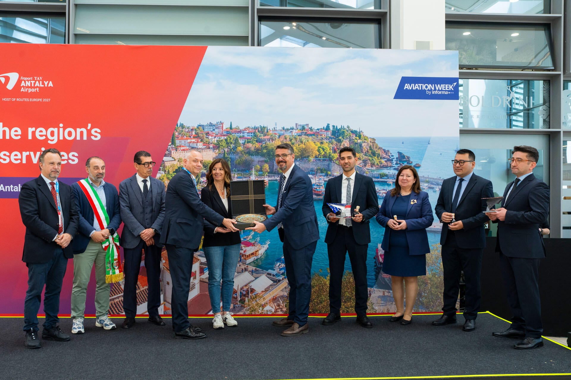 The formal handover of hosting responsibilities for Routes Europe 2027 to Fraport TAV Antalya Airport.