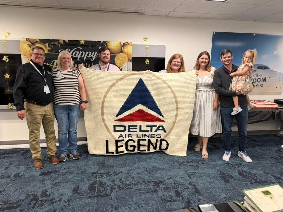 Joe, Brandon and Kevin Steiper with their families.