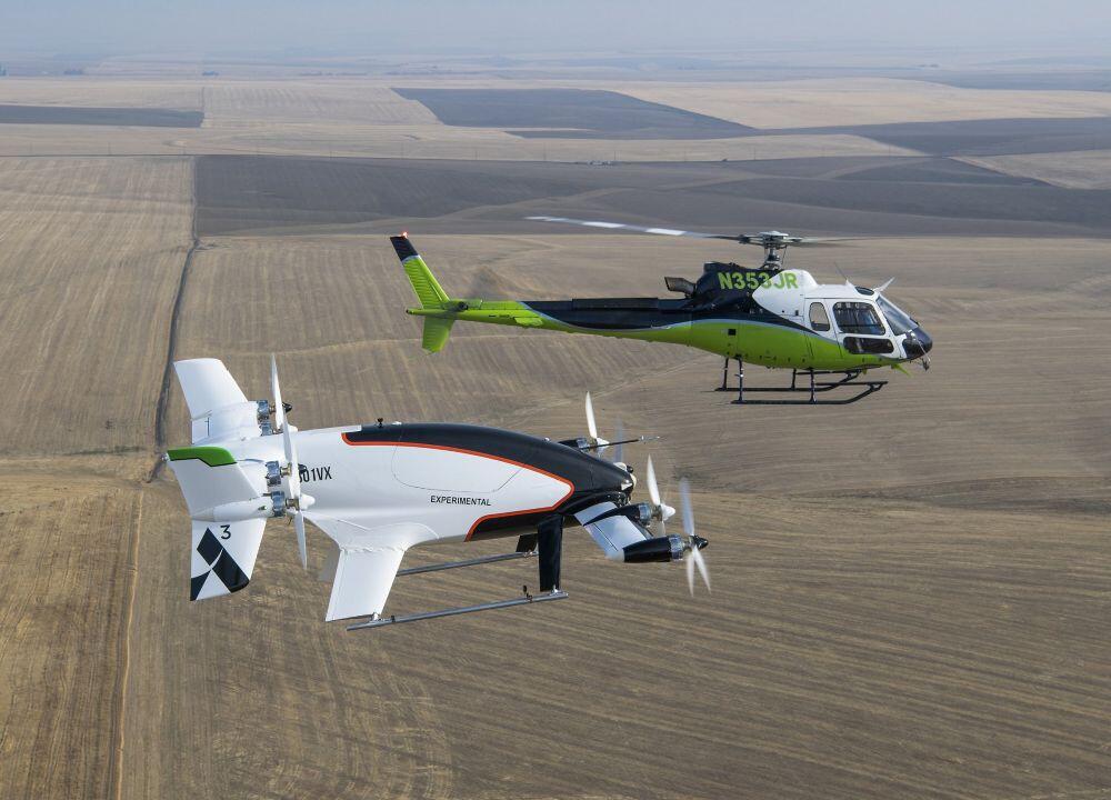 Art credit: Airbus Caption: Acubed's autonomous Vahana (foreground) demonstrated full transition between vertical and wingborne flight in 2019
