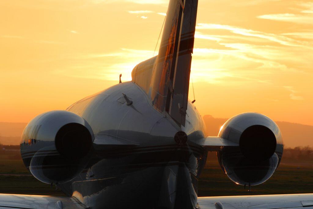 Business jet in the sunset 