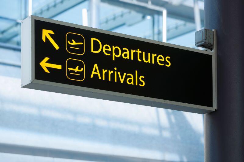 UK Departures Arrivals sign