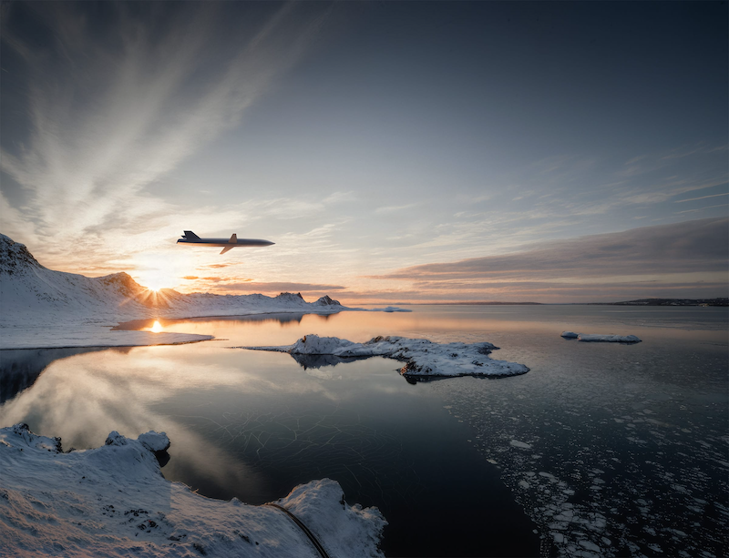 plane flying over water and ice
