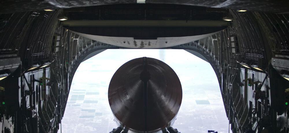 AirLaunch Drop Test Article exits a C-17 at 32,000 feet, during a late-July test. (Air Force photo by Jim Shryne)