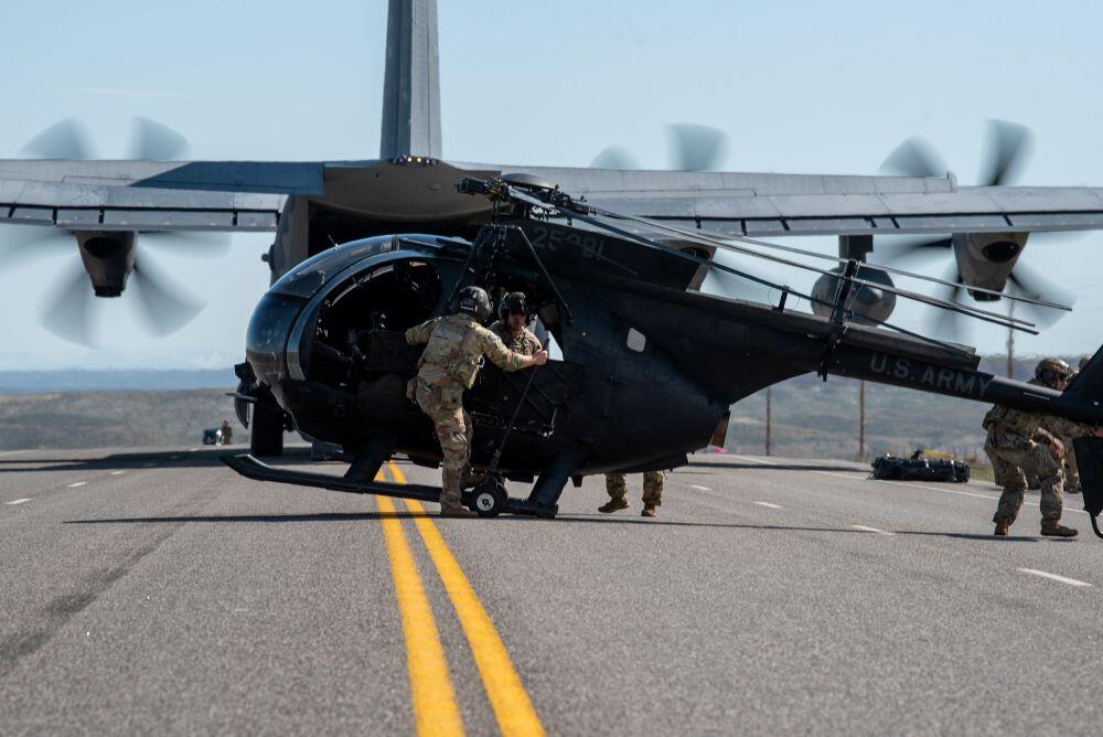 Special operators unload an MH-6 from an MC-130 during a May 2023 exercise. Credit: Air National Guard