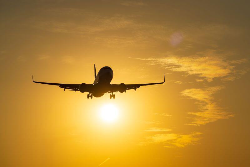 generic airplane inflight in a sunset