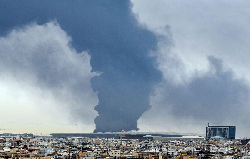 Smoke billows following a strike at a fuel depot at Kuwait International Airport in Farwaniya Governorate, Kuwait, March 25, 2026
