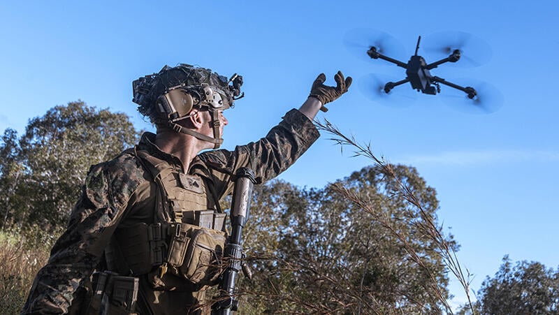 soldier launching a drone