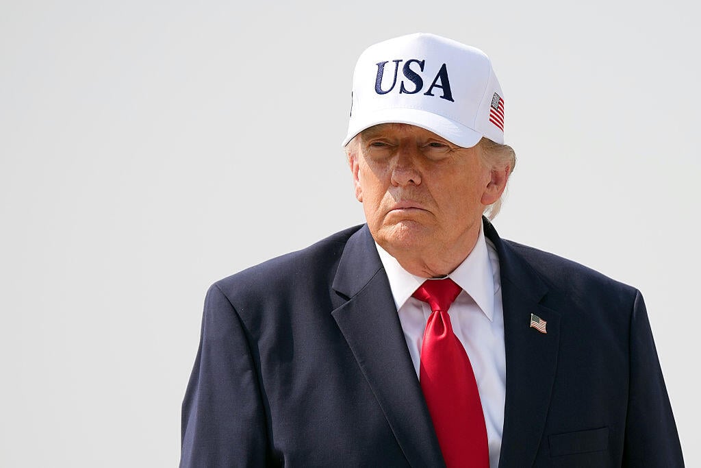 President Trump wearing a USA cap