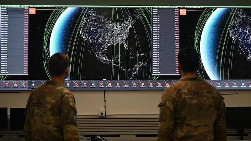 Space Defense Squadron members operate the ATLAS system 