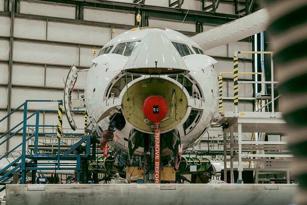 CRJ aircraft in hangar