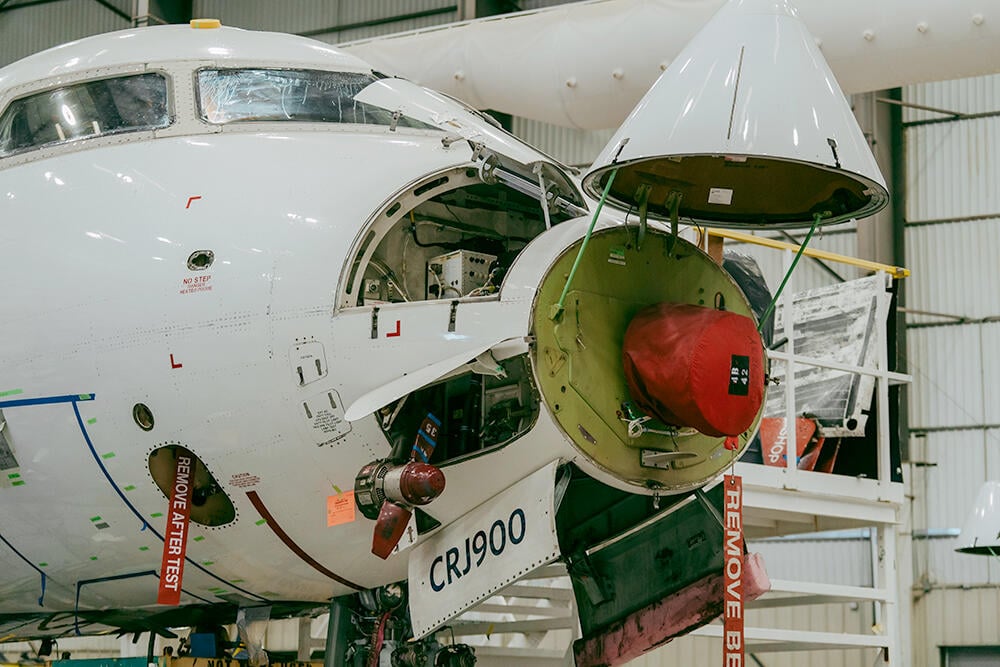 CRJ aircraft in hangar