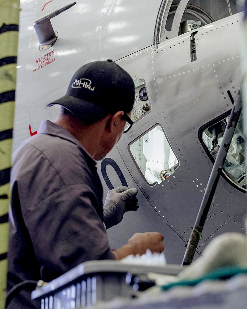 Technician working on aircraft