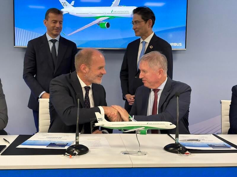 smbc execs shaking hands with airbus execs