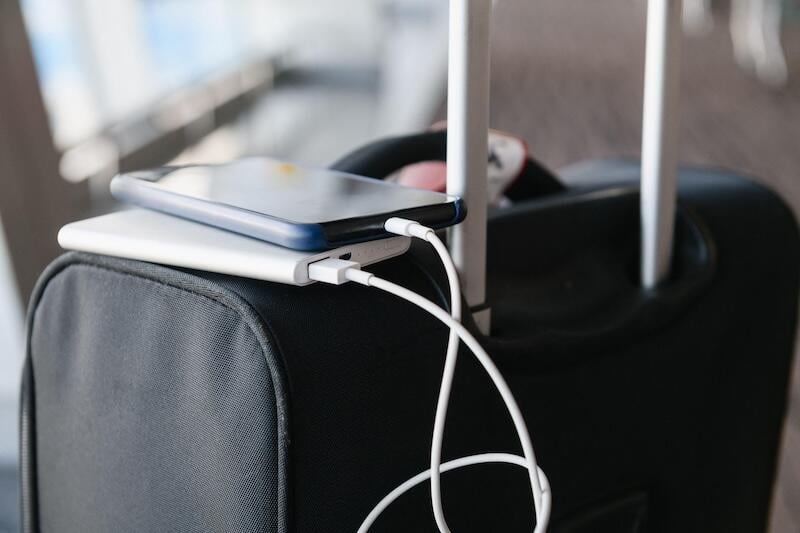portable charger on suitcase