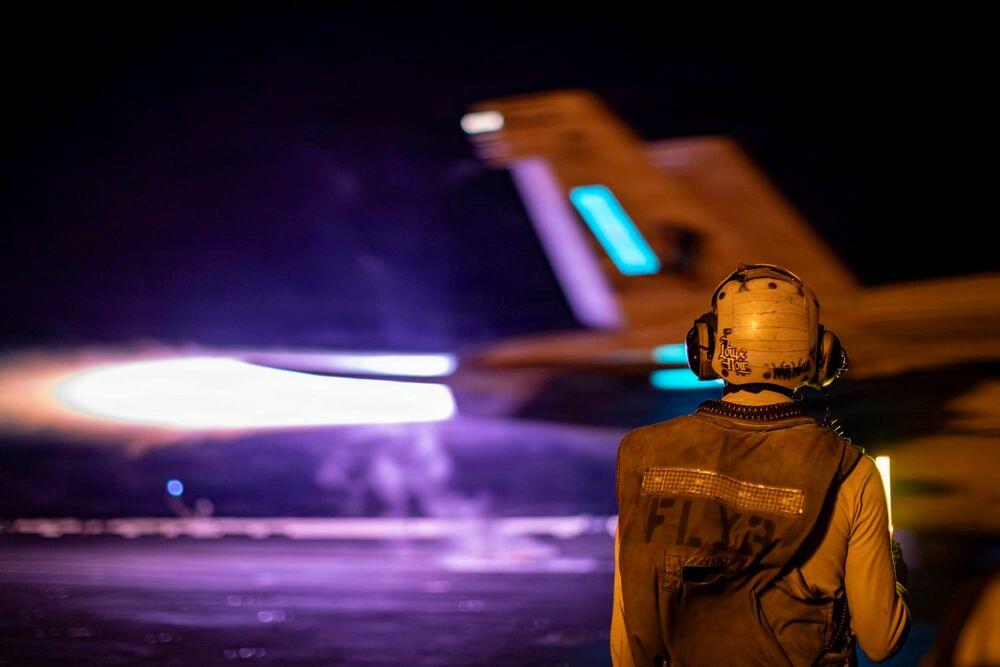 A U.S. Navy F/A-18 launches from the USS Abraham Lincoln on Aug. 12 in the Middle East. U.S. Navy photo