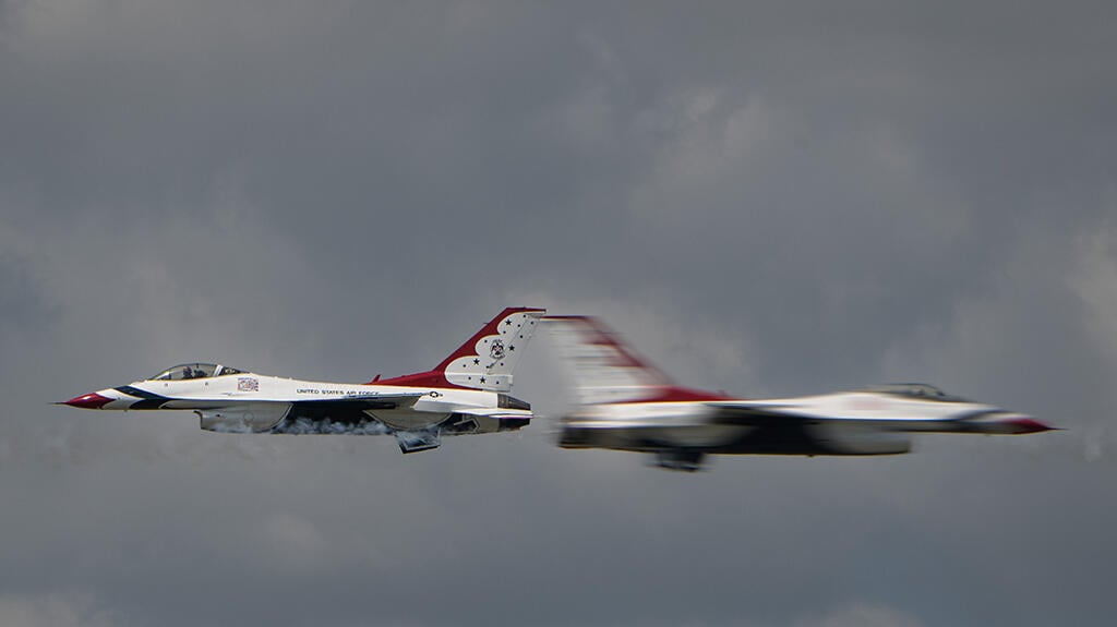 U.S. Air Force Thunderbird F-16s performing a flyby