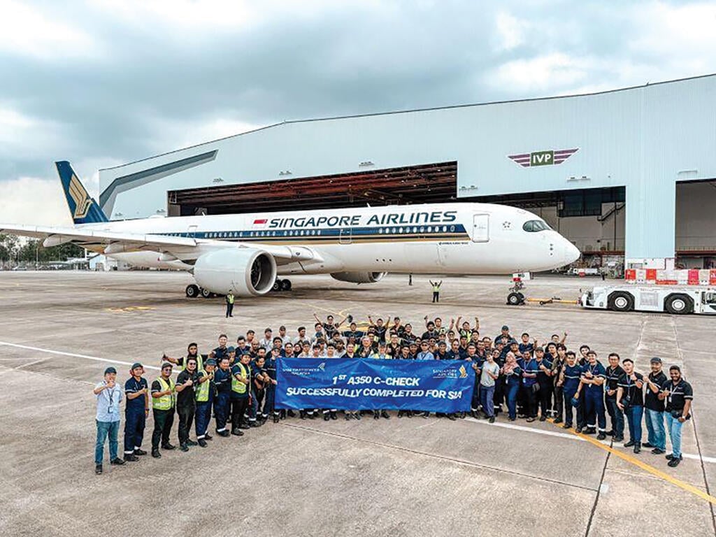 SIA Engineering Co. engineering and maintenance team at Base Maintenance Malaysia facility with Singapore Airlines Airbus A350-900