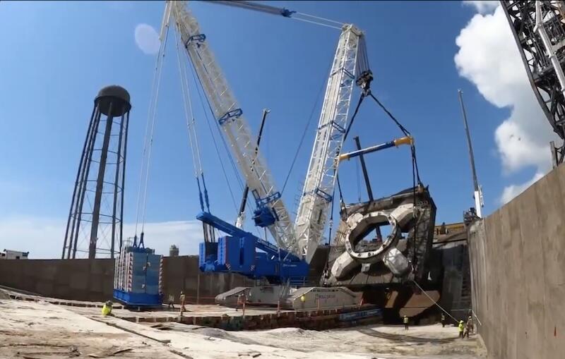 The 2 million-lb. launch table at SLC-36 was lifted out of flame trench in July for inspections and adjustments. 