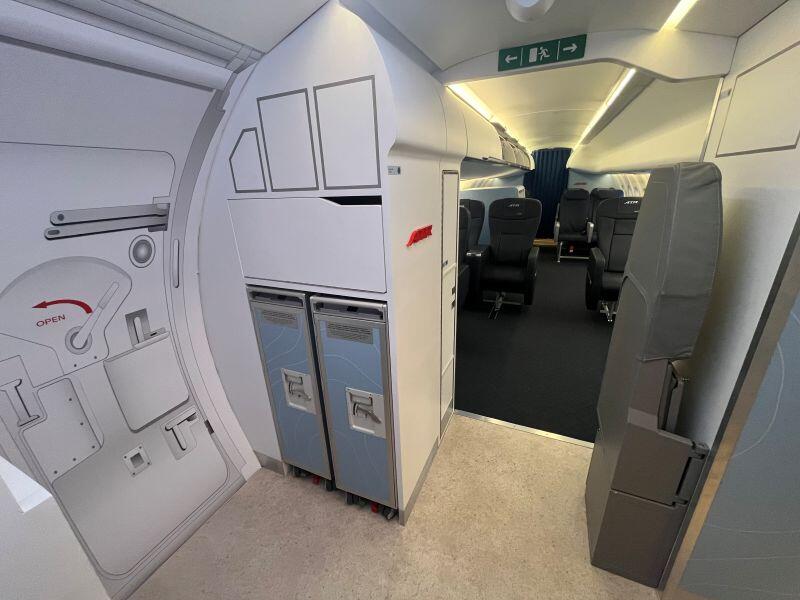 Concept of a three-class ATR 72 with a forward door for jet-bridge compatibility.