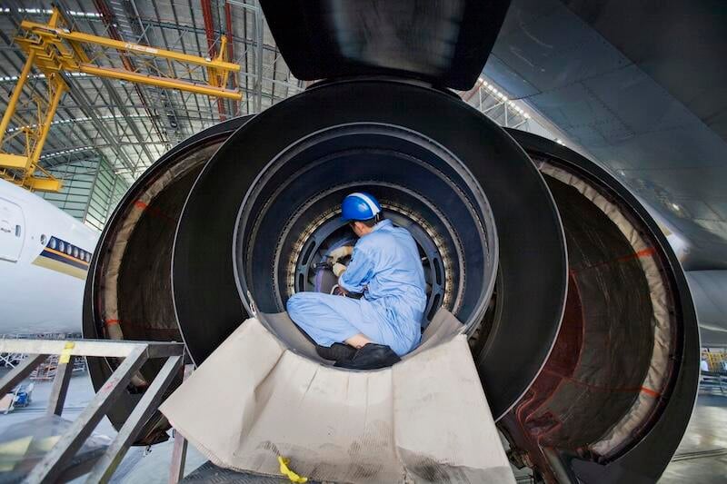 engineer working at aviation maintenance facility